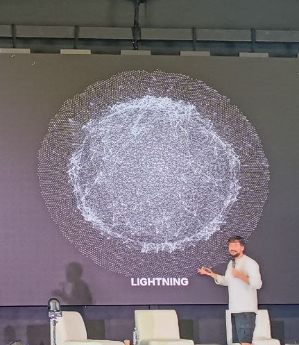 Francis on stage with Lightning network visualization